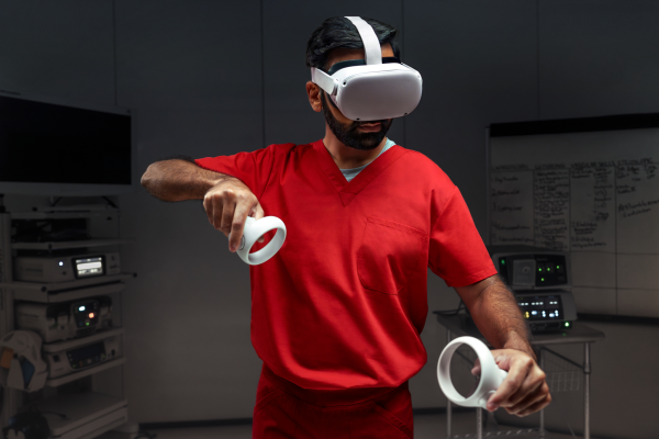 Man using VR headset for surgical training in hospital