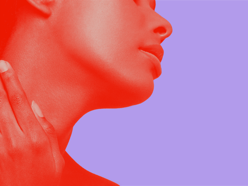Profile of female with hand on neck.