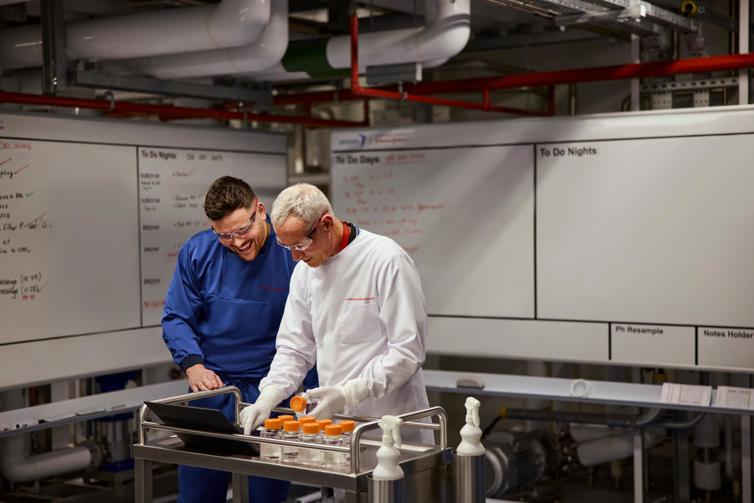 Two J&J employees enjoying collaborative teamwork