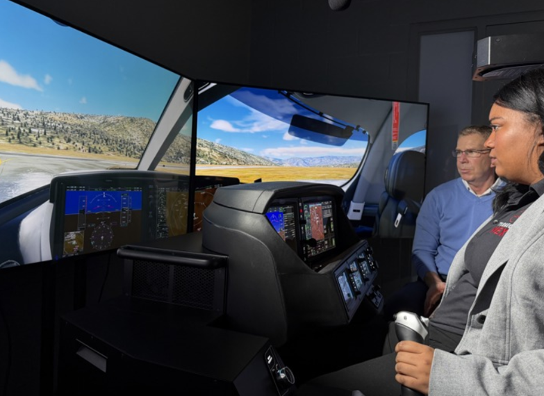 J&J employee practicing on our flight simulator