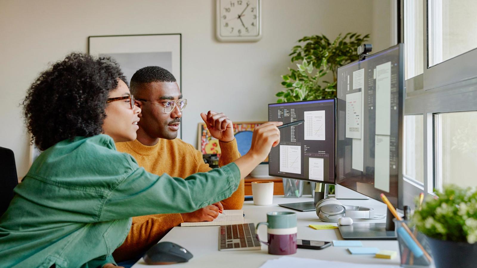 JJ Photo Colleagues Discussing Project Over Computer