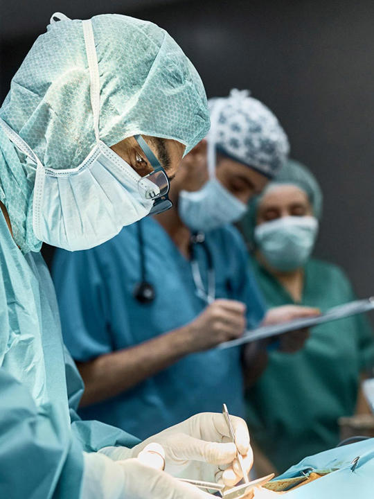 JJ Doctor Performing Surgery