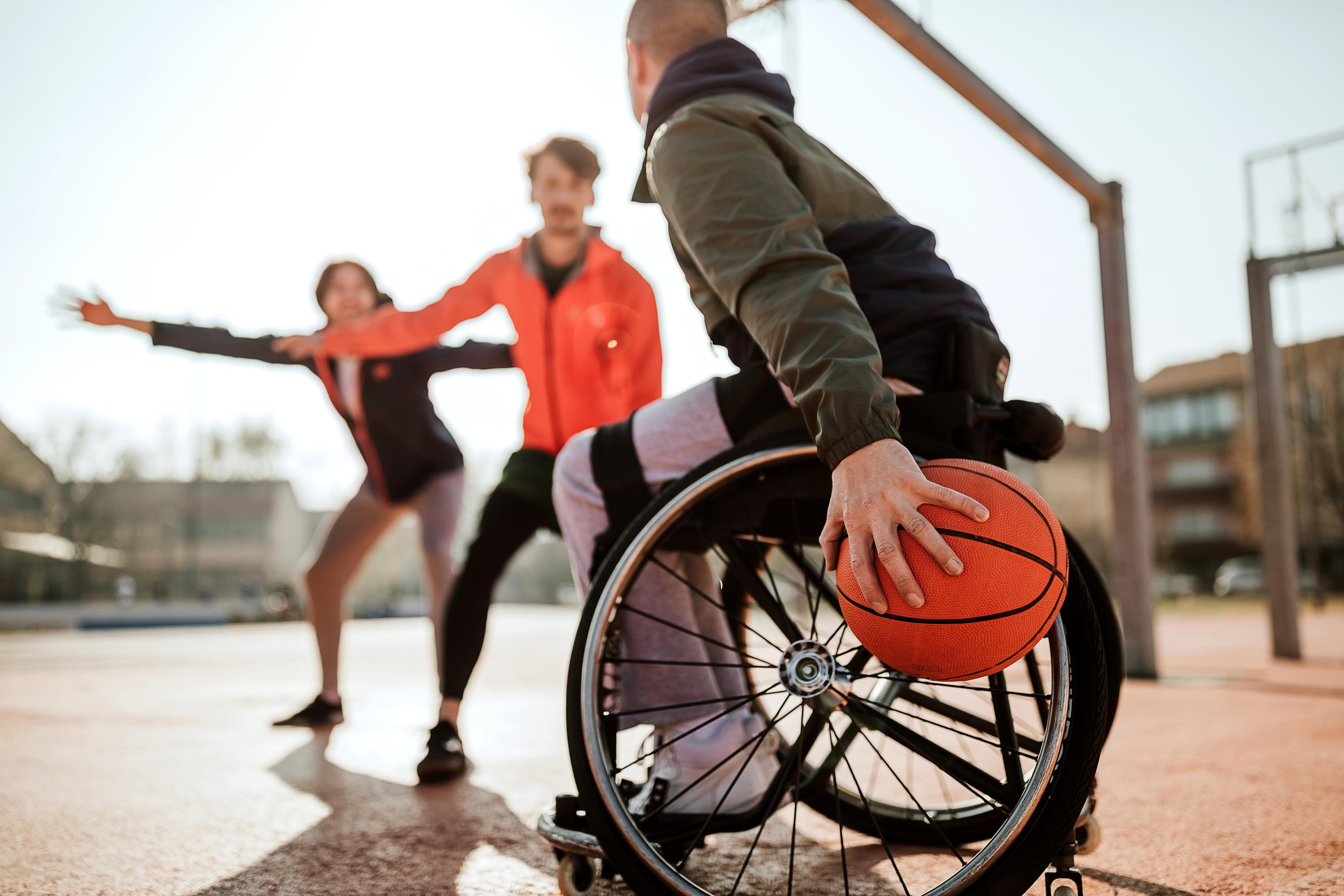 JJ Photo Man In Wheelchair Playing Basketball Gettyimages 1291654139