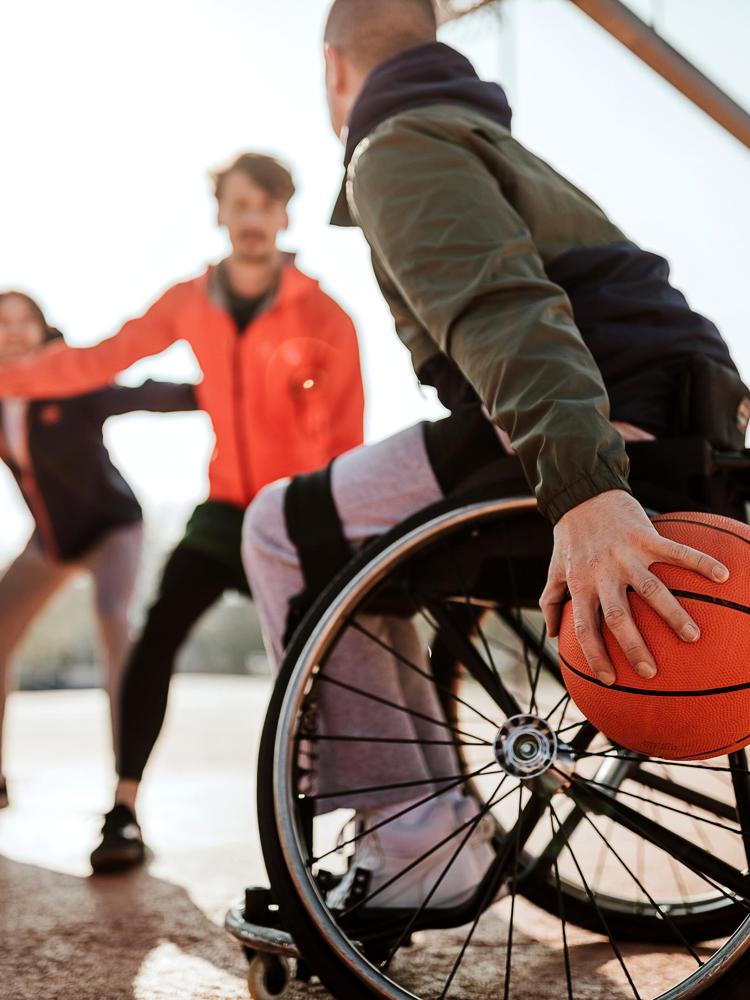 JJ Photo Man In Wheelchair Playing Basketball Gettyimages 1291654139