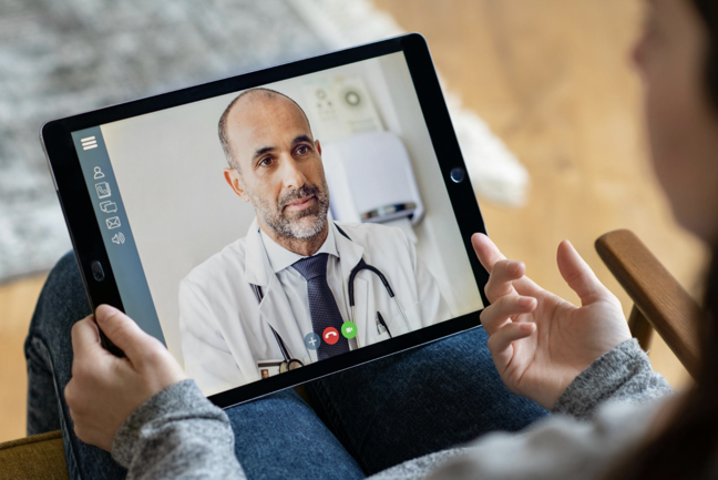 A mental health professional provides counseling through a telehealth platform