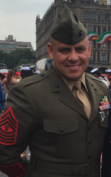 Cesar, an RN with 26 years of service with the U.S. Marine Corps