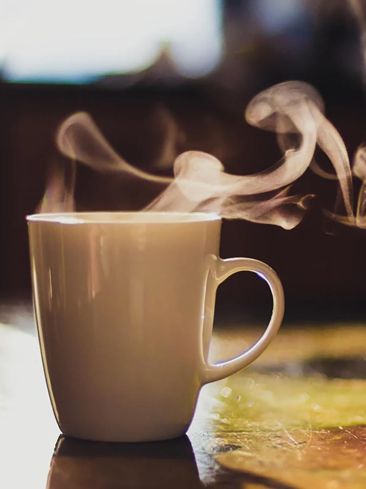 Steaming mug of coffee
