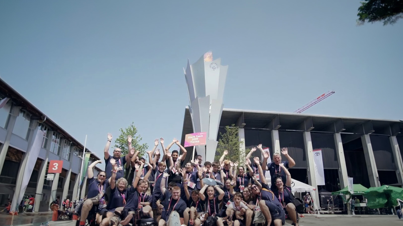 A group of people at a J&J facility celebrating Special Olympics